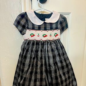 Rare Editions smocked Christmas dress size 2T. Excellent used condition.